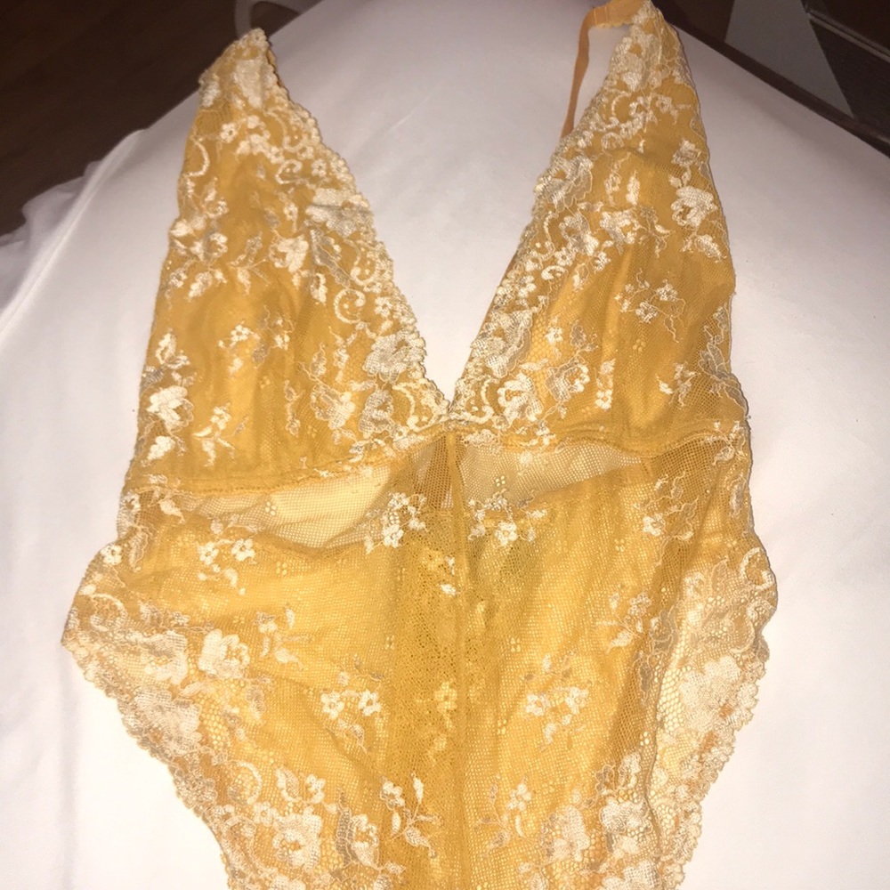 Yellow bodysuit